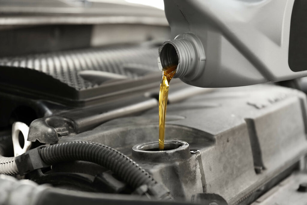 Semi truck receiving oil changes during a scheduled service